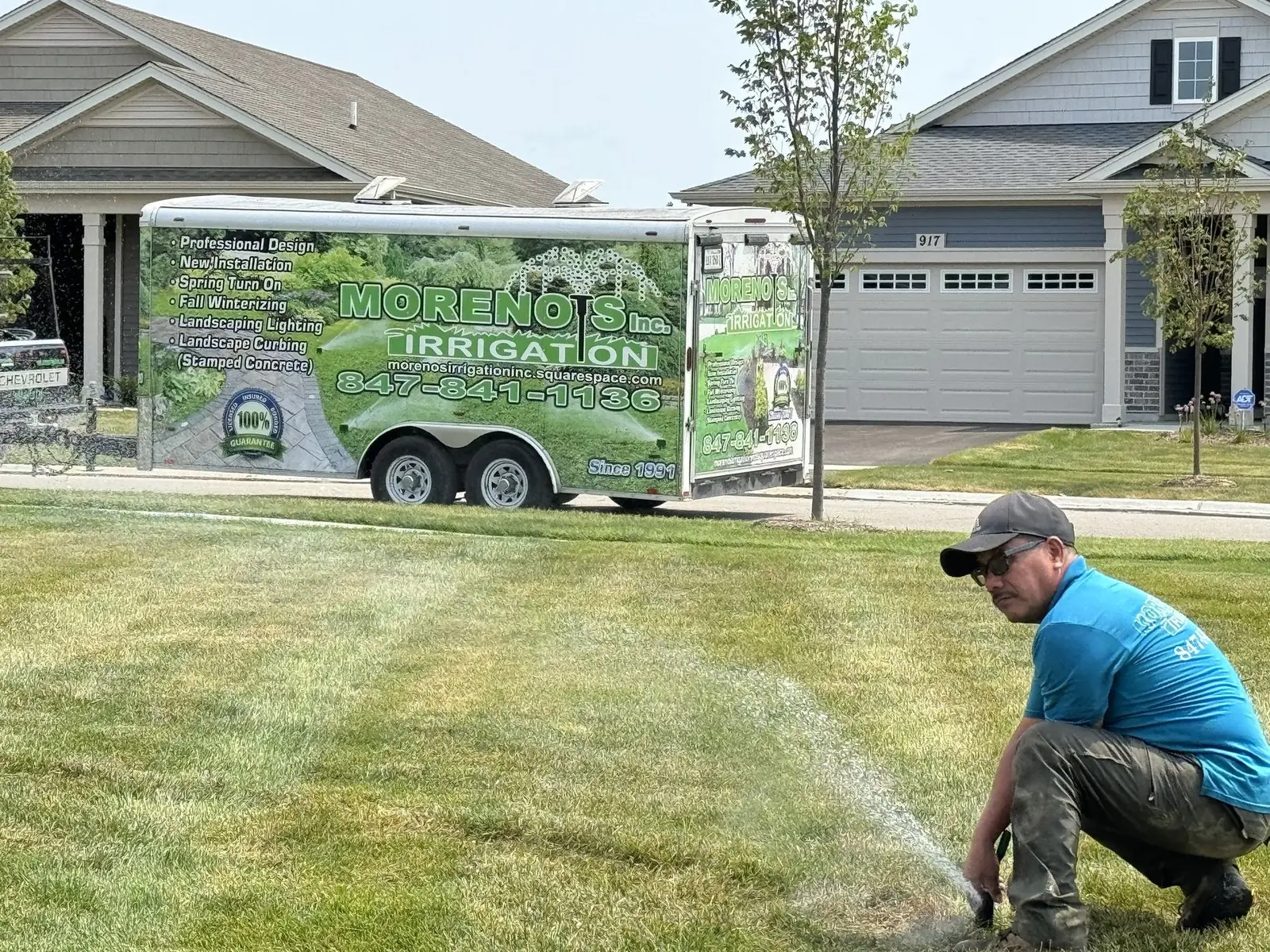 Moreno's Irrigation technician configuring a sprinkler system
